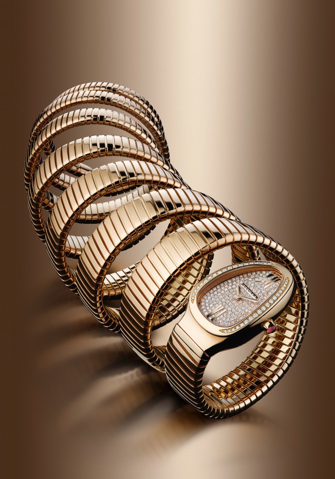 101938- Serpenti watch, 35mm, pink gold-diamonds case, Full setting dial, Quartz movement, pink gold bracelet, 7 loops, Diamonds mounted 1.1100 carats