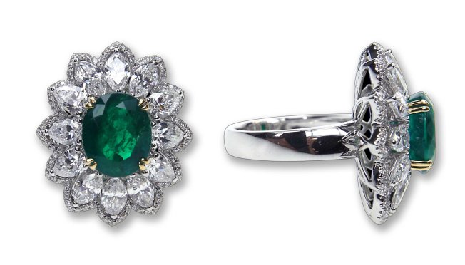 Entice cocktail ring with oval emerald center and surrounding marquise diamonds